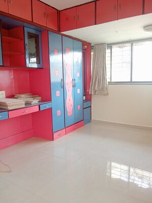 Room in 2 BHK Apartment at Badri Kedar Building, Seawoods Sector 40 – for Rent