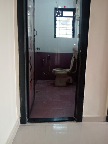 Bathroom in 2 BHK Apartment at Badri Kedar Building, Seawoods Sector 40 – for Rent