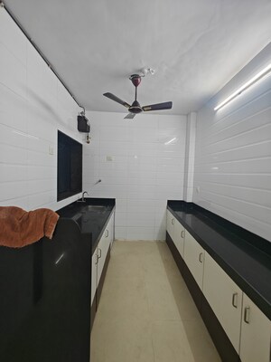 Kitchen in 3 BHK Apartment at Shiva Palm Beach CHS, Nerul Sector 4 – for Rent