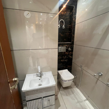 Bathroom in 4 BHK Builder Floor at Vipin Garden – for Sale