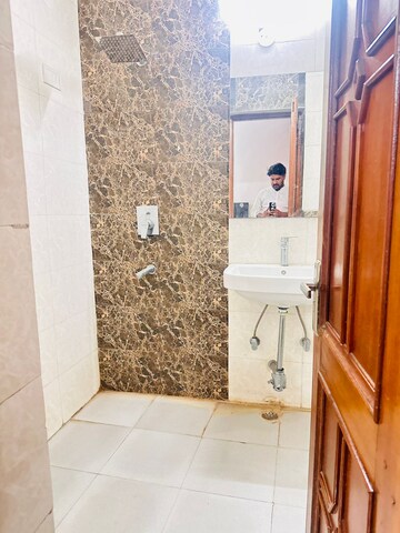 Bathroom in 2 BHK Apartment at Unitech Uniworld Gardens 2, Sector 47 – for Rent