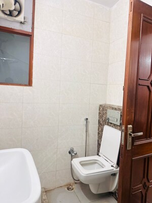 Bathroom in 2 BHK Apartment at Unitech Uniworld Gardens 2, Sector 47 – for Rent