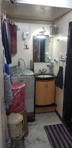 Bathroom in 1 BHK Apartment at Karltopon Apartment, Santacruz East – for Sale