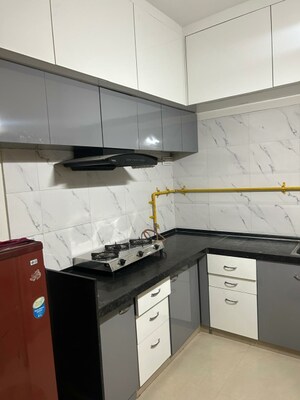 Kitchen in 2 BHK Apartment at Poddar Heights, Chandkheda – for Rent