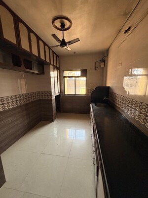 Kitchen in 1 BHK Apartment at Vedant Complex CHS, Samata Nagar – for Sale