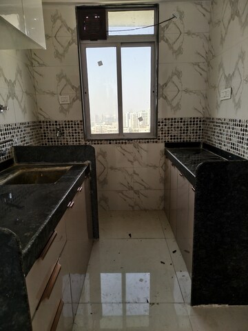 Kitchen in 1 BHK Apartment at DGS Sheetal Tapovan, Malad East – for Rent