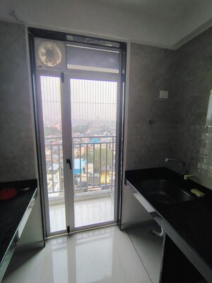 Building Lobby in 2 BHK Apartment at Ajmera Crosstown One, Kalyan West – for Rent