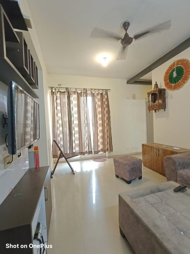 Living Room, gaur-city-1st-avenue 2 Bedroom 715 Sq.Ft. Apartment In Sector 4 Greater Noida Greater Noida 9467544