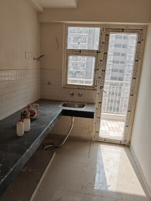 Kitchen in 2 BHK Apartment at Shree Vardhman Green Court, Sector 90 – for Sale