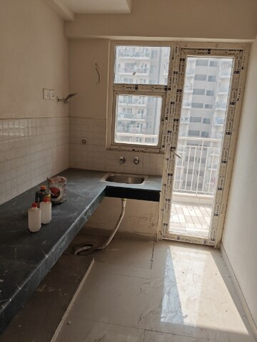 Kitchen in 2 BHK Apartment at Shree Vardhman Green Court, Sector 90 – for Sale