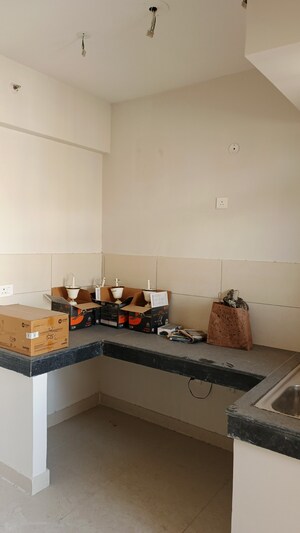 Kitchen in 2 BHK Apartment at Tata Eureka Park, Sector 150 – for Rent