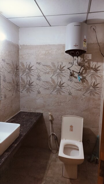 Bathroom in 1 BHK Apartment at Paramount Golfforeste, Zeta I Greater Noida – for Rent