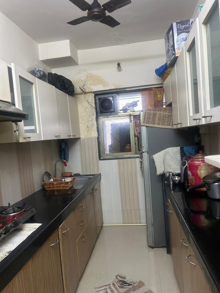 Kitchen, ajmera-bhakti-park 2 Bedroom 715 Sq.Ft. Apartment In Bhakti Park Mumbai 9467778