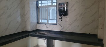 Kitchen in 2 BHK Apartment at Bunty Mayur Kilbil, Dhanori – for Rent