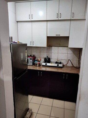 Kitchen in 2 BHK Apartment at Stellar Jeevan, Sector 1 Greater Noida – for Rent