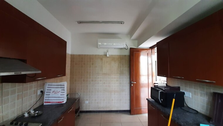 Kitchen, jaypee-greens-the-castille 4 Bedroom 3000 Sq.Ft. Apartment In Jaypee Greens Greater Noida 9468091