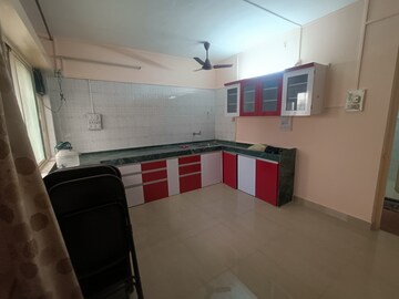 Kitchen in 2 BHK Apartment at Sun City, Sinhagad Road – for Rent