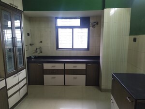 Kitchen in 2 BHK Apartment at Kohinoor CHS, Sector 8 Sanpada – for Rent