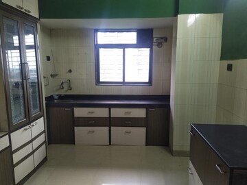 Kitchen in 2 BHK Apartment at Kohinoor CHS, Sector 8 Sanpada – for Rent