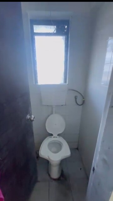 Bathroom in 1 BHK Apartment at Dosti West County Phase 4 Dosti Pine, Balkum Pada – for Rent