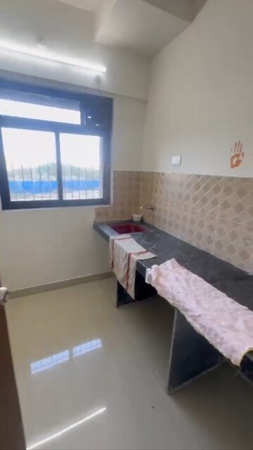 Kitchen in 1 BHK Apartment at Dosti West County Phase 4 Dosti Pine, Balkum Pada – for Rent