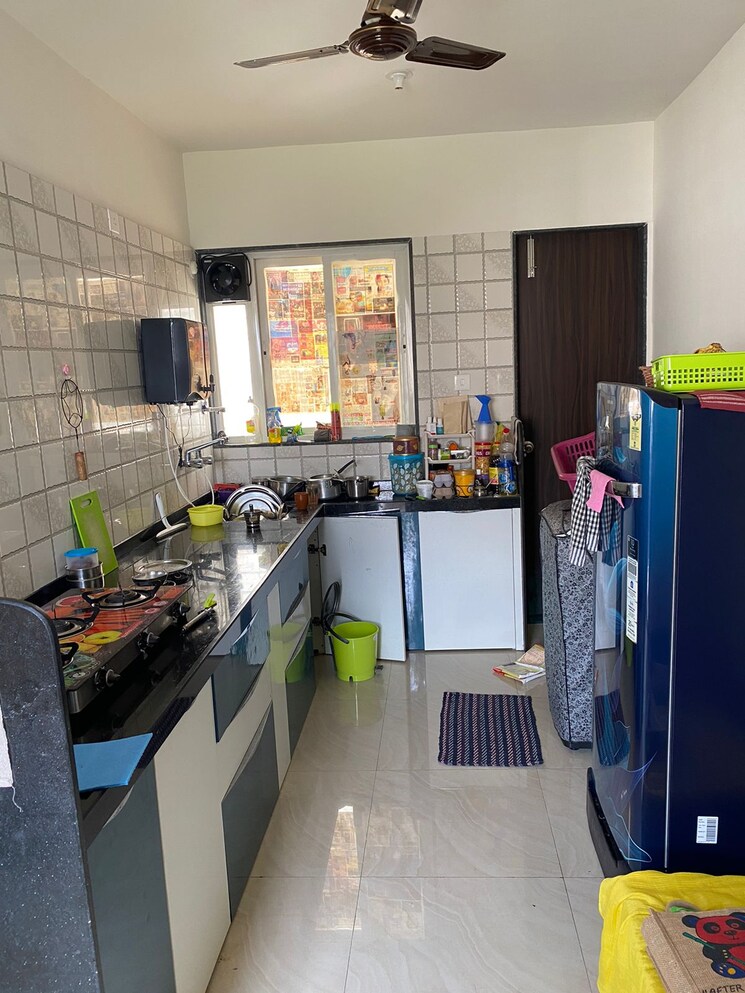 Kitchen, kuber-imperia 2 Bedroom 685 Sq.Ft. Apartment In Wakad Pune 9468134