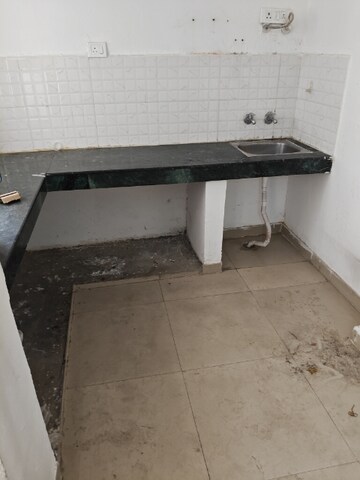 Kitchen in 2 BHK Apartment at Shree Vardhman Green Court, Sector 90 – for Sale