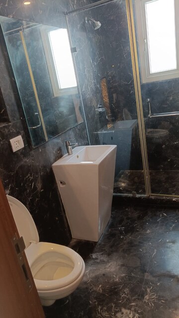 Bathroom in 4 BHK Builder Floor at Green Park Extension – for Rent
