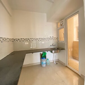 Kitchen in 2 BHK Apartment at Signature Global Orchard Avenue, Sector 93 – for Rent