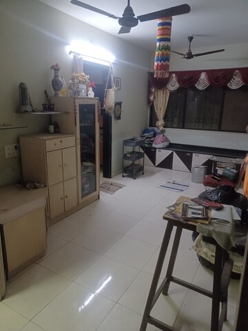 Master Bedroom in 1.5 BHK Apartment at Milind Madhura Tower, Amboli – for Sale