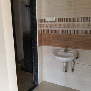 Bathroom in 2 BHK Apartment at Nisarg Hill Crest, Ravet – for Rent