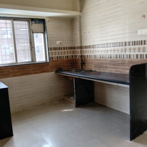 Kitchen in 2 BHK Apartment at Nisarg Hill Crest, Ravet – for Rent