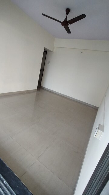 Room in 2 BHK Apartment at Satyam Heights Seawoods, Seawoods – for Rent