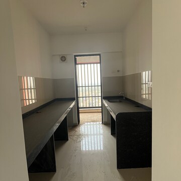 Kitchen in 1 BHK Apartment at Lodha Palava Florea A To D, Taloja Bypass Road – for Sale