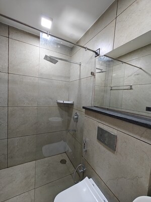 Bathroom in 3 BHK Builder Floor at Patel Nagar Society, Sector 15 – for Rent