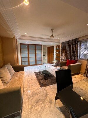 Living Room in 1 BHK Apartment at Godrej The Trees, Vikhroli East – for Rent