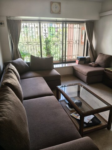 Living Room in 2 BHK Apartment at Gundecha Symphony, Andheri West – for Rent