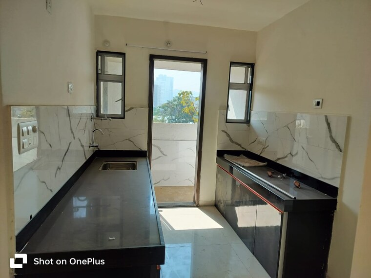 Kitchen, blue-27th-avenue 2 Bedroom 1000 Sq.Ft. Apartment In Bavdhan Pune 9470022
