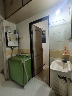 Bathroom in 2 BHK Apartment at Metro Tulsi Heights, New Panvel – for Sale