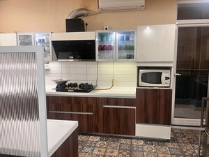 Kitchen in 4 BHK Apartment at ABA Cleo County, Sector 121 – for Sale