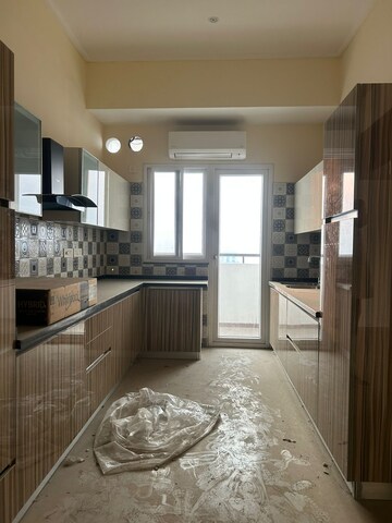Kitchen in 3 BHK Apartment at ABA Cleo County, Sector 121 – for Sale