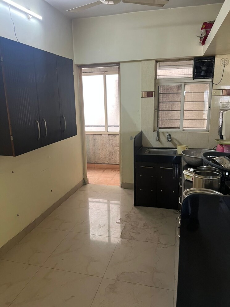 Kitchen, hari-ganga 2 Bedroom 970 Sq.Ft. Apartment In Yerawada Pune 9470183