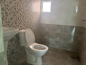 Bathroom in 3 BHK Apartment at JKG Palm Court, Sector 16c Greater Noida – for Rent