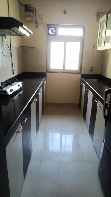 Kitchen in 2 BHK Apartment at Rustomjee Athena, Majiwada – for Sale