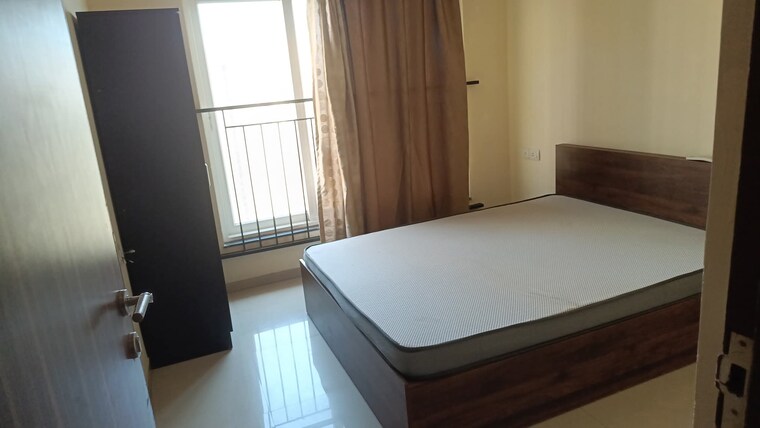 Bedroom, rustomjee-athena 2 Bedroom 900 Sq.Ft. Apartment In Majiwada Thane 9470368