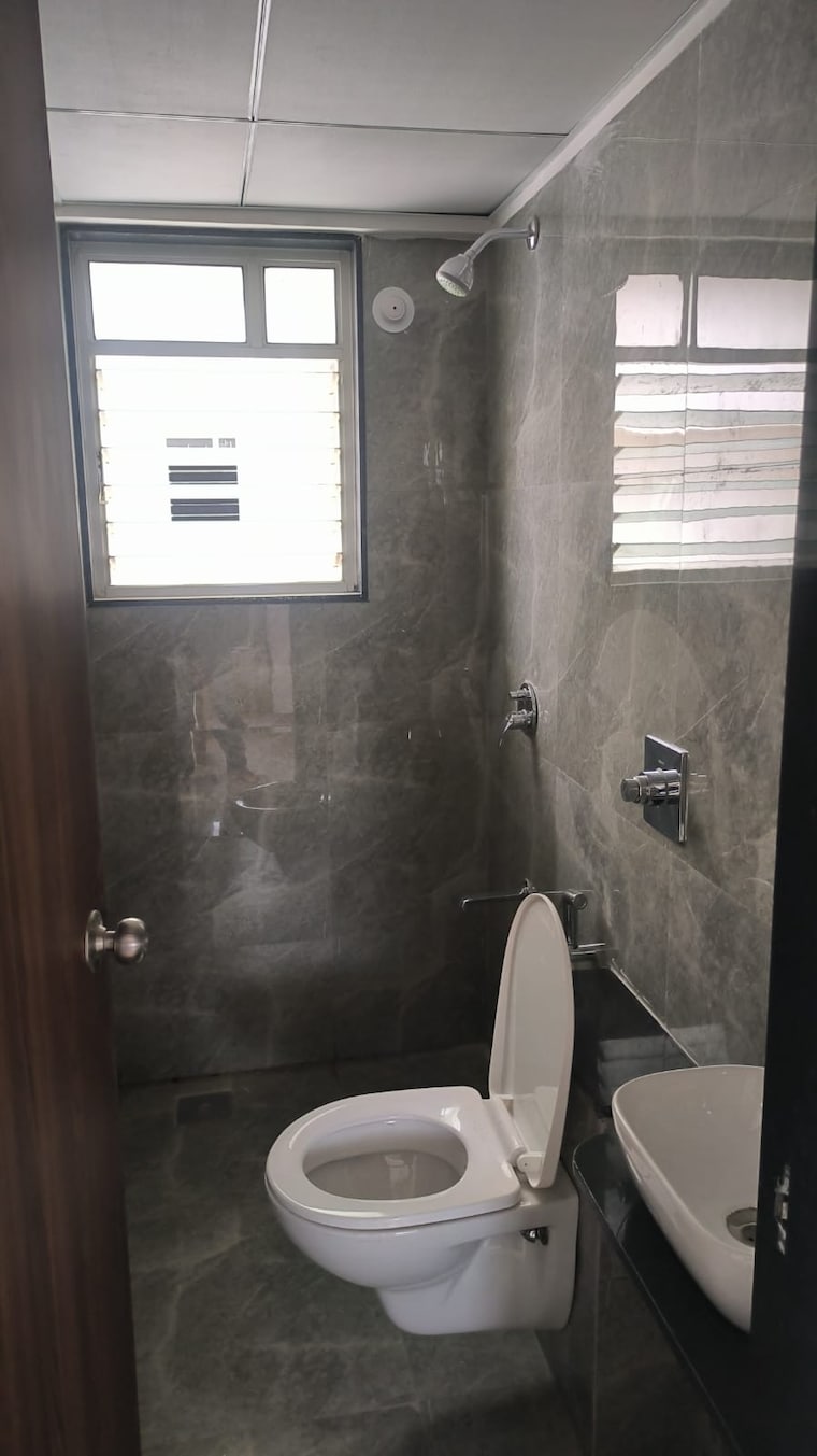 Bathroom, krisala-41-cosmo 3 Bedroom 1213 Sq.Ft. Apartment In Tathawade Pune 9470396