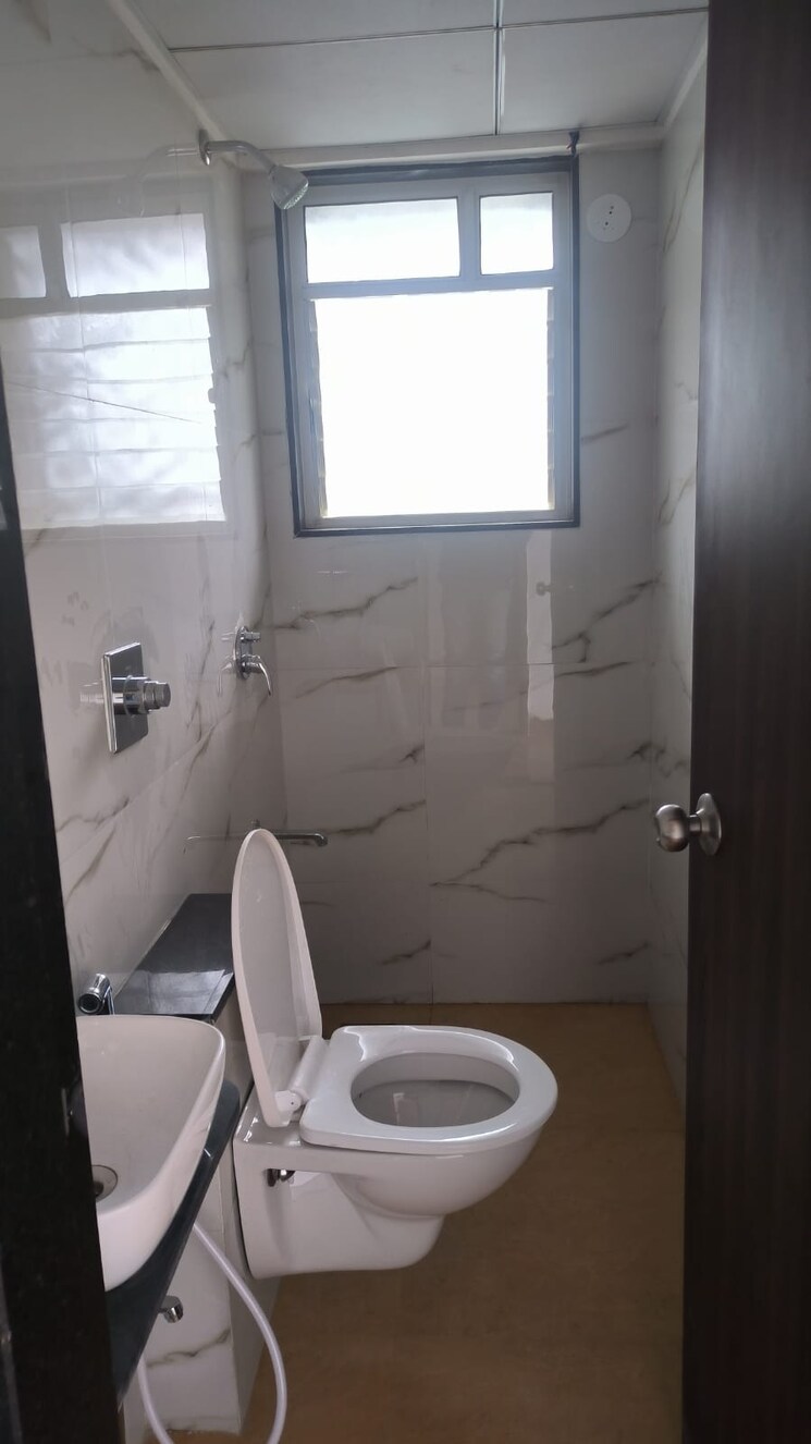 Bathroom, krisala-41-cosmo 3 Bedroom 1213 Sq.Ft. Apartment In Tathawade Pune 9470396