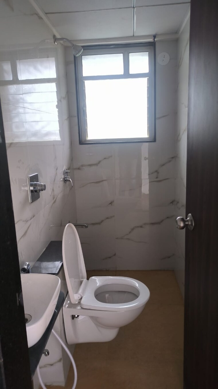 Bathroom, krisala-41-cosmo 3 Bedroom 1213 Sq.Ft. Apartment In Tathawade Pune 9470396