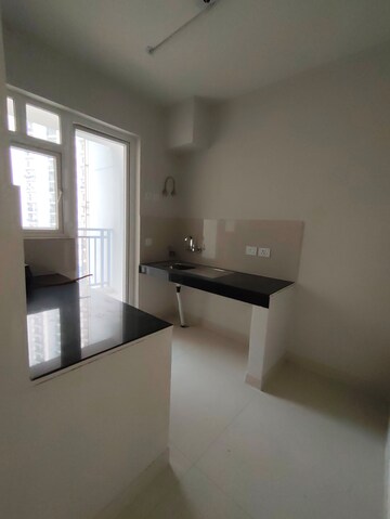 Kitchen in 2 BHK Apartment at Eldeco Live By The Greens, Sector 150 – for Rent