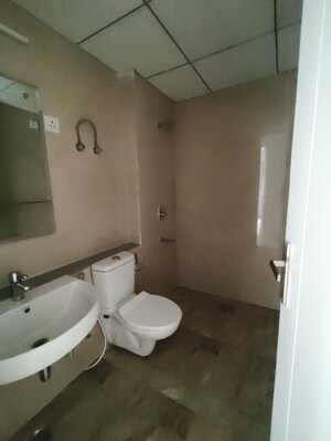 Bathroom in 2 BHK Apartment at Eldeco Live By The Greens, Sector 150 – for Rent